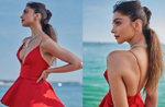 Deepika Padukone is the stylish Cannes Red Carpet Siren in a stunning red Louis Vuitton Gown